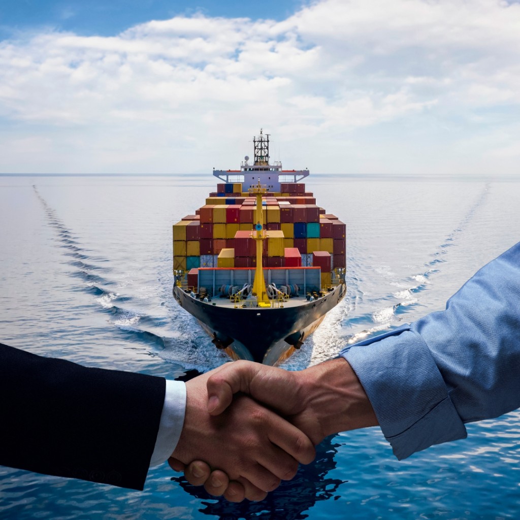 Ship charter broker handshake — container vessel at sea